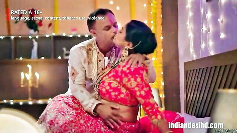 Indian couple in traditional attire kissing passionately in Ullu web series scene