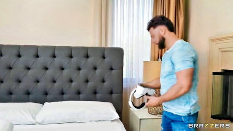 Nika Venom VR fuck thumbnail: handsome bearded man holds headset in bedroom