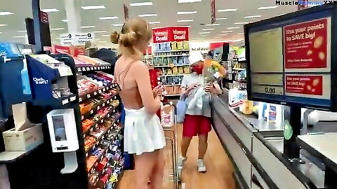 Bryce Adams in skimpy white mini dress at supermarket checkout for Thanksgiving