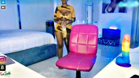 Katt Leya in revealing zebra outfit teasing with large dildo