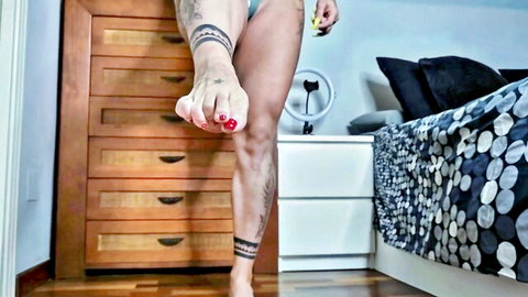 Dana X Muscles flexing tattooed muscular legs in blue panties