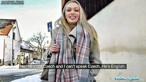 Blonde busty cougar Amber Jayne smiling in winter coat outdoors