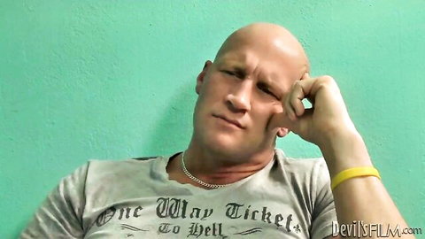 Ryder Monroe, bald muscular trans model in thoughtful pose, Tranny Pros thumbnail