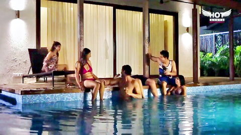 Indian bikini babes and guys lounging by pool in erotic scene