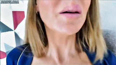Seductive blonde stepmom teases with glossy lips in blue top, close-up