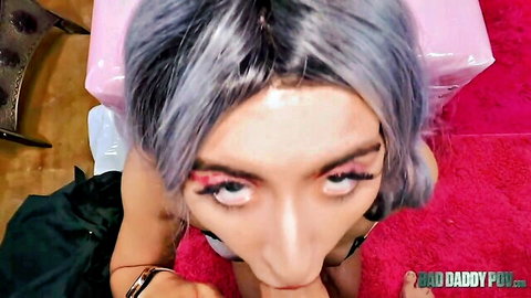 POV of young Asian teen with small natural tits and purple hair sticking tongue out ready to suck daddy cock