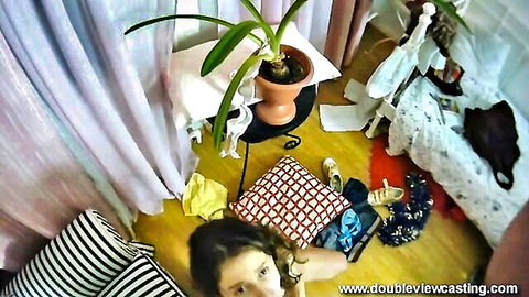 POV of cute petite girlfriend looking up from messy bedroom floor surrounded by scattered panties bras and heels