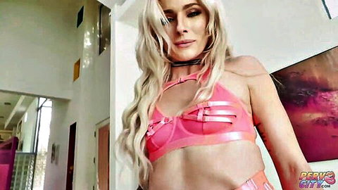 Hyley Winters blonde babe in pink latex harness seductive pose