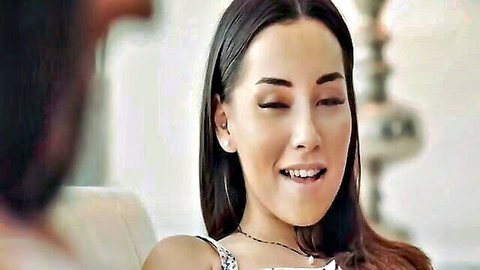 Aria Lee and Texas Patti smiling intimately in low-cut tops, lesbian tease