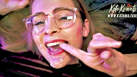 Kate Kravets blonde with glasses, smiling tongue out with cum facial and peace sign