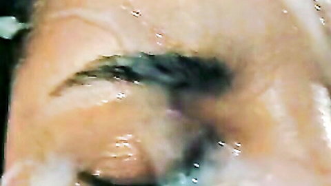 Adriele close-up wet face with facial cumshot in adult video
