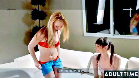 Blonde in red bikini teases pigtail brunette on cam in first lesbian encounter