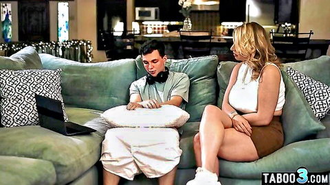 Blonde big tits MILF stepmom flirts with young stepson on couch in taboo scene