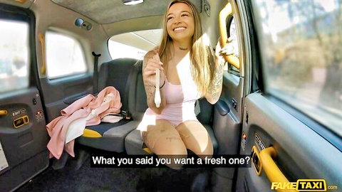 Katty Soarez tattooed blonde in Fake Taxi holds fresh dildo