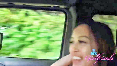 Petite Asian girlfriend teases by sucking finger in mouth POV car ride