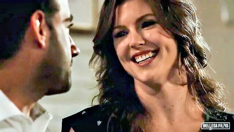 Brunette woman smiling intimately as man admires her in cunnilingus scene