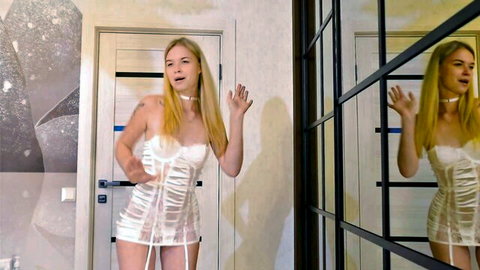 Blonde teen heystesha in sheer white lingerie, posing with choker