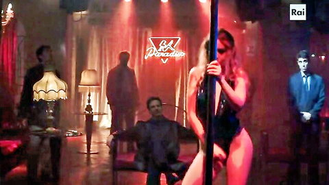Linda Caridi in black lingerie pole dancing hot scene from Il Cacciatore