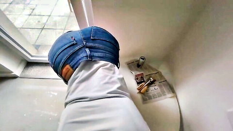 Cute amateur girl bent over in tight jeans, ass exposed from behind
