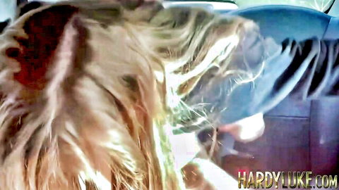 Blonde woman deepthroating cock in taxi backseat blowjob