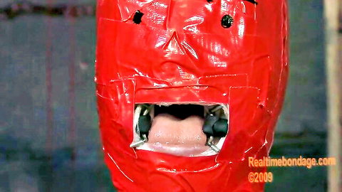 Claire in red duct tape bondage mask, exposed mouth and tongue
