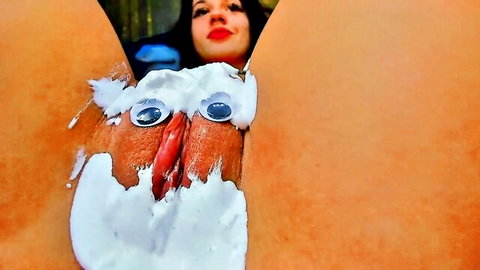 RedAssHottie exposes pink pussy in Santa-themed foam play