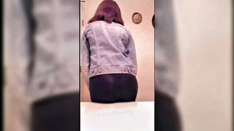 Ebony woman in denim jacket and tight black pants, big ass from behind in fart fetish thumbnail