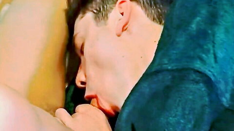 Handsome twink getting cock sucked by lover in close embrace