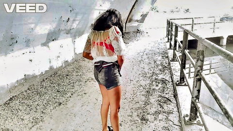 Latina babe in sheer top and tiny skirt walks in public teasing her sexy ass cheeks
