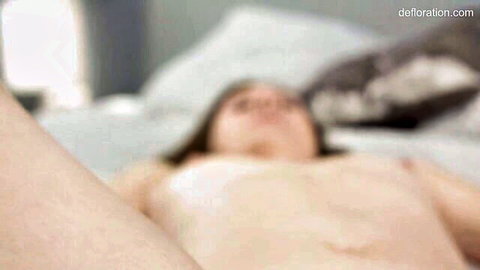Alessandra Amore nude in gonzo defloration, lying on bed