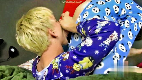 Blonde twink Jordan giving oral to Timo in festive pajamas