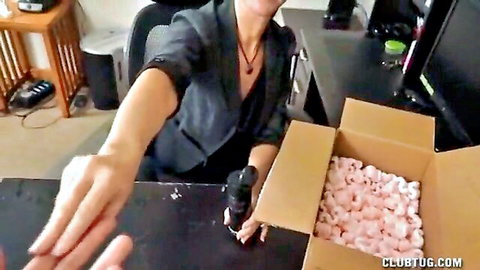 Mature brunette MILF in office blazer teases huge black dildo unpacked from box