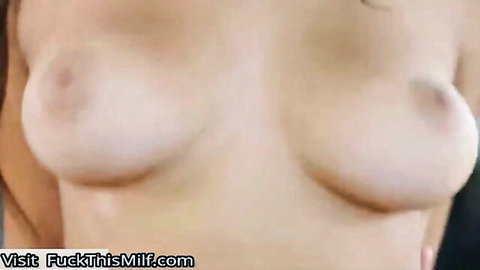 Topless black-haired teen with perky breasts in explicit close-up