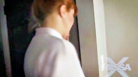 Penny Pax redhead in white blouse, seductive side profile from Mommy's Valentine