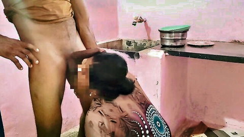 Indian wife kneels before husband's exposed cock in kitchen