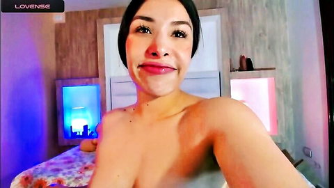 Stunning topless Latina smiling in solo amateur adult video