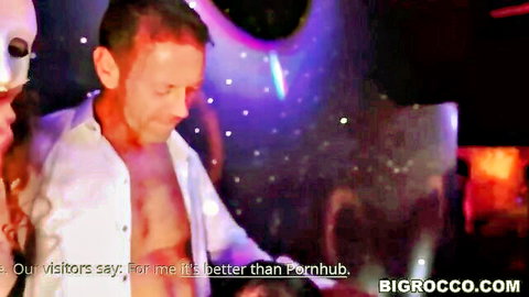 Rocco Siffredi with masked woman in open shirt tease, better than Pornhub