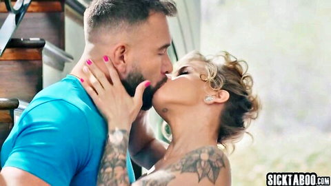 Jesse Pony with big tits passionately kissing tattooed friend