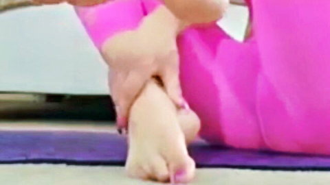 Alexa Nova's sexy feet in pink leggings, foot fetish pose for fans