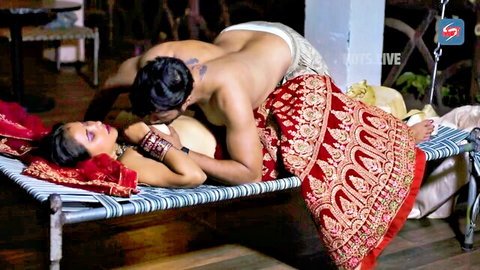 Desi beauty in red lehenga topless, lover fondles her breasts intimately