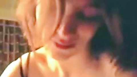 Smiling dark-haired slim girl giving handjob with happy expression