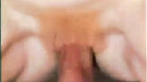 Blurry close-up of mature granny's wide-open mouth and wrinkled face in intense rough sex moan