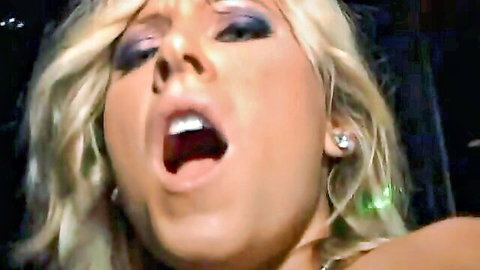 Blonde beauty with ecstatic open-mouth expression during intense party fuck