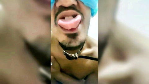 Daddy Miguel blindfolded with collar, tongue out in ecstasy, intense gay sex moan