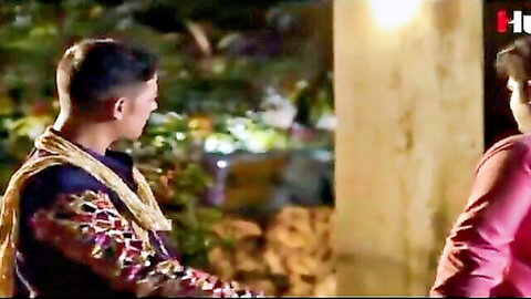 Two Indian men in embroidered traditional outfits chatting intimately, Hangout 2024 Hunt Ep 02