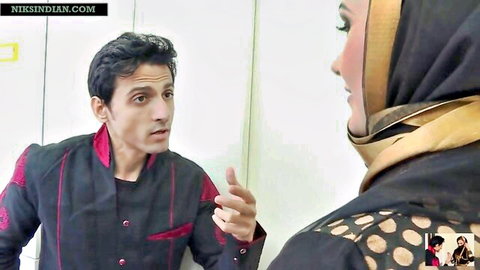 Indian Muslim wife in hijab chatting with stranger in shirt