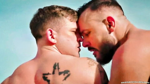 Sir Peter and Andrew Delta intense face-to-face embrace shirtless on Costa del Sol