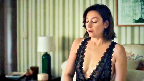 Audrey Cornardeau in seductive black lace lingerie, deep cleavage tease