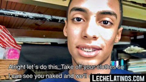 Young Latino guy smiling inviting you to strip naked on webcam