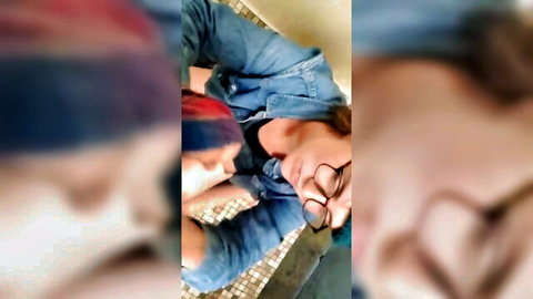 Blurry thumbnail of glasses-wearing brunette in denim giving blowjob